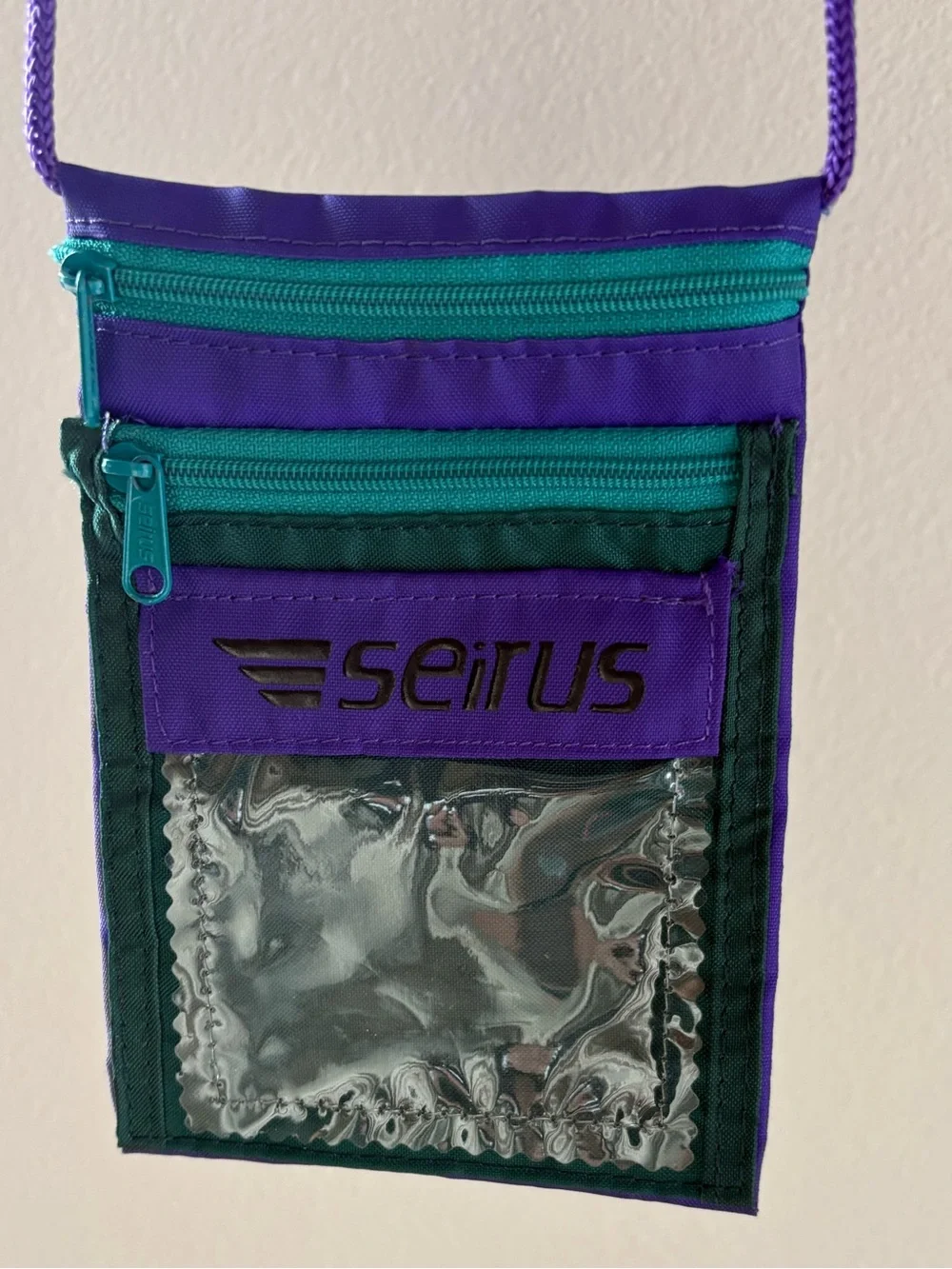 Seirus Purple and Teal Neck Pouch with Clear ID Window